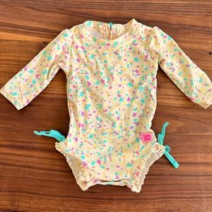 Ruffle Butts infant swimsuit
